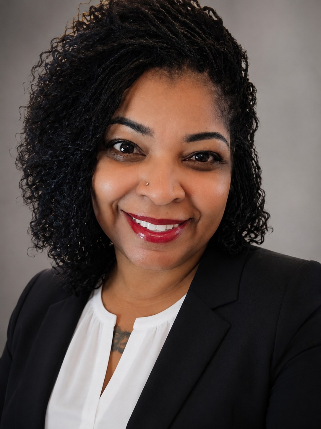 Professional portrait of Tequilla Pittman, Founder & Clinical Director